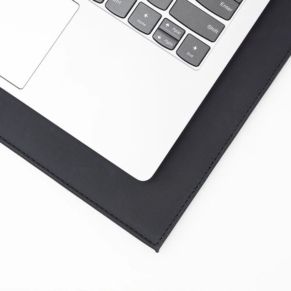 Durable heat-insulating anti-radiation tablet pad in four colour variations on a desk