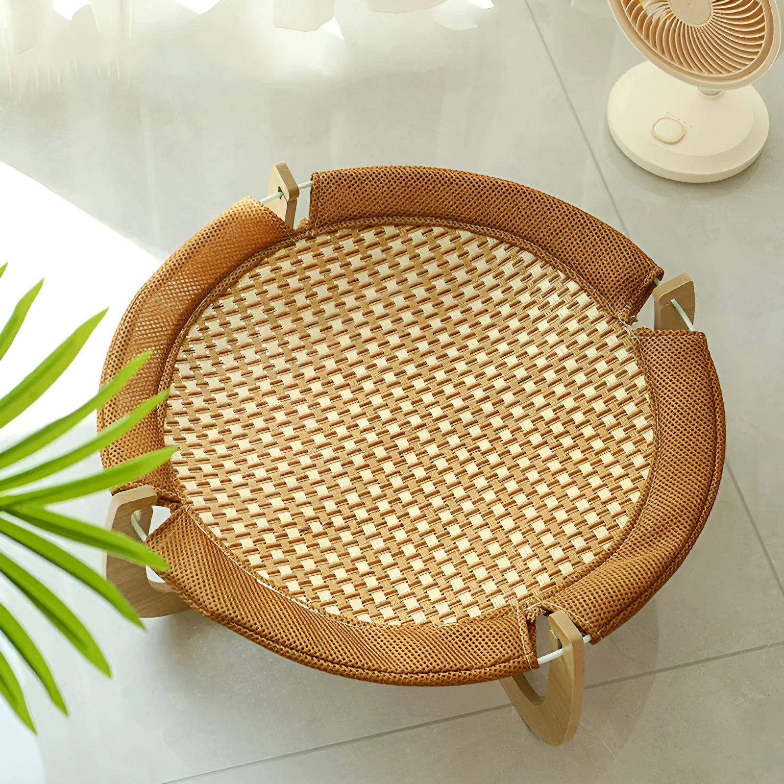 Brown woven rattan pet hammock bed measuring 46cm square with crib-style sides