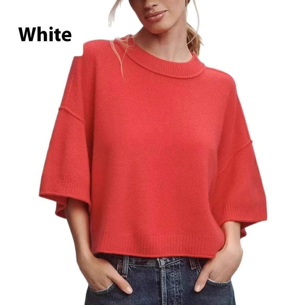 Red cropped short sleeve T-shirt with an exposed navel design on a mannequin.