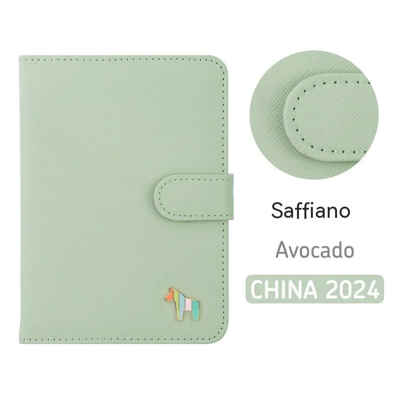 Compact leather-covered 396-day schedule book for hand accounting, shown lying open flat.