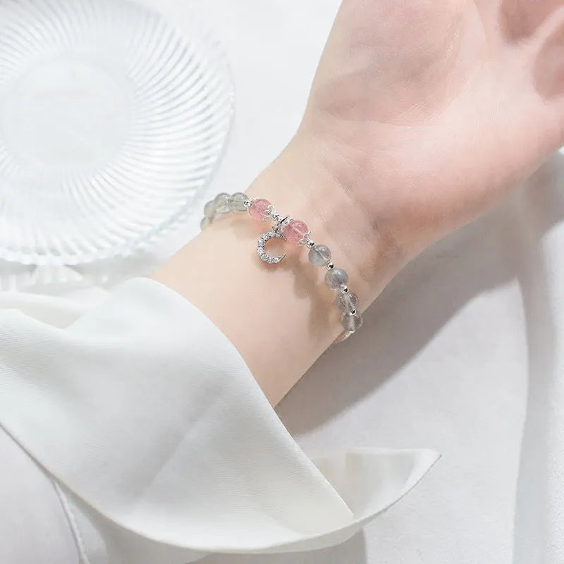 Handmade natural moonstone bracelet with crescent charm on adjustable 16-19cm chain