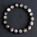 Obsidian crater ball bracelet with grinding texture in silver or gold meteorite finish