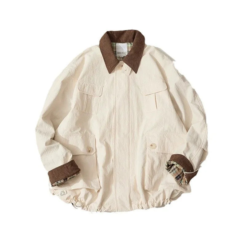 Green casual polyester jacket for men and women with side pockets on a hanger.