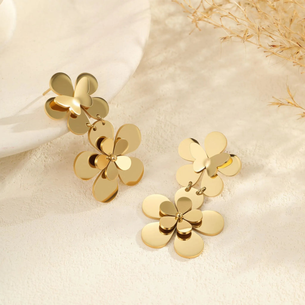 Gold flower butterfly stainless steel earrings with geometric and zodiac design elements