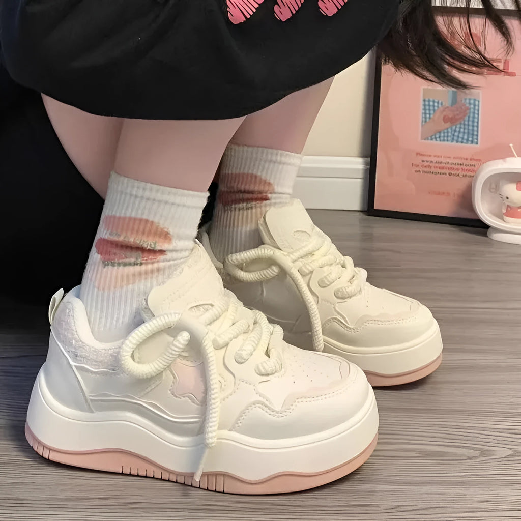 Women's green platform sneakers with patent leather finish and round toe front lace-up design