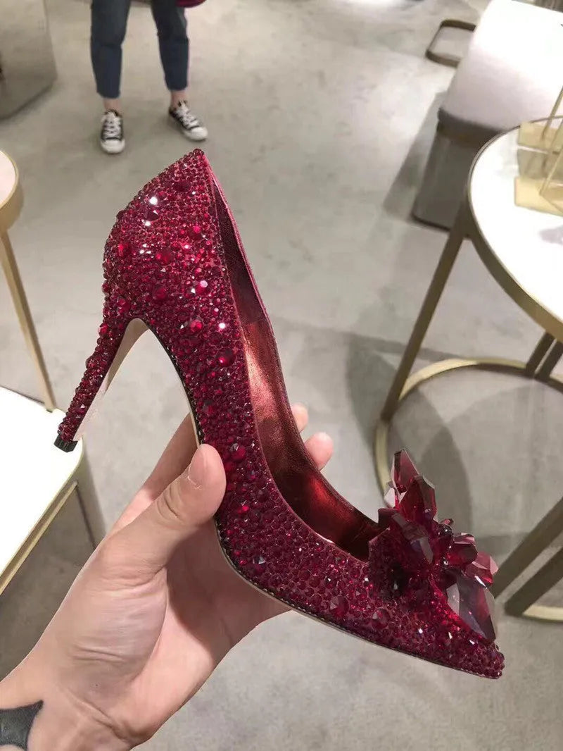 Women's gold pointed toe high heels with rhinestone decoration and stiletto heel