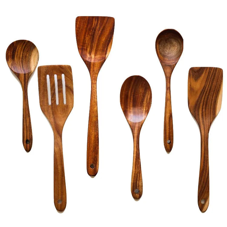 Seven wooden cooking utensils including spoons and shovels with non-slip handles