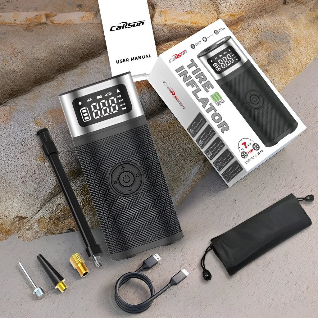 Black portable wireless air pump with USB charging cable and multiple nozzle attachments including bicycle, ball, and swimming ring connectors