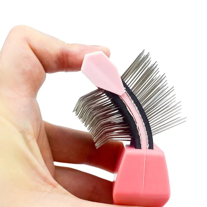 Blue double sided pet brush for dogs with stainless steel pins on a white background