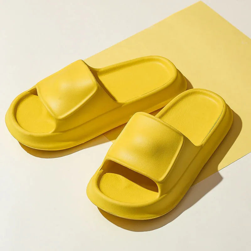 Soft EVA flip-flop slippers with thick non-slip soles in multiple colours on a white background.
