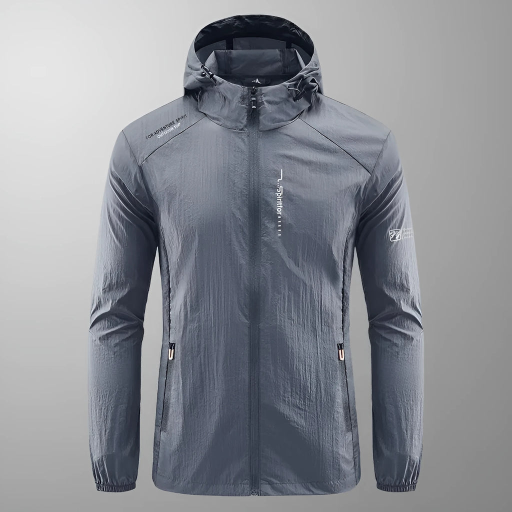 Men's thin nylon hooded summer top in light grey on a hanger