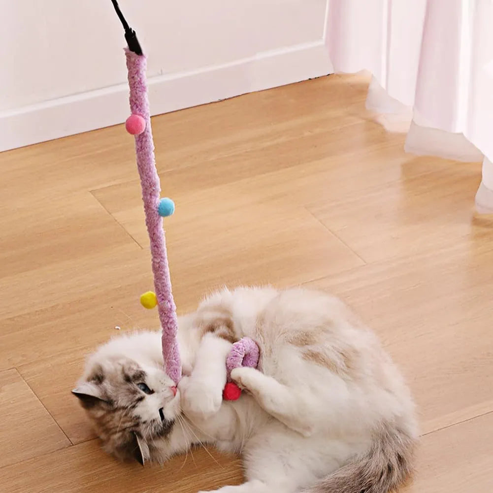 Interactive cat wand toy with a long blue plush strip, fluffy ball, and bells on a stick.