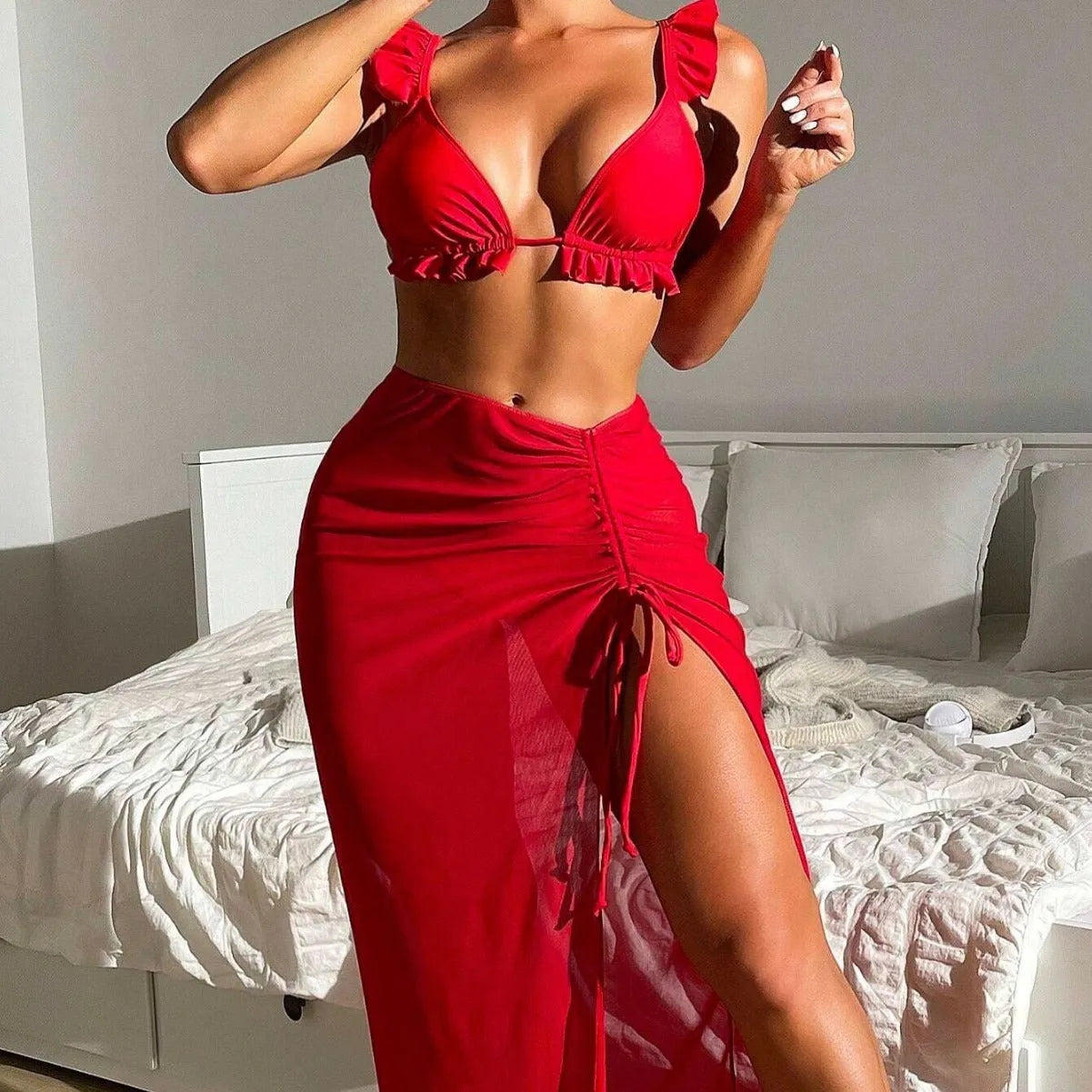 Women's printed split style bikini three-piece swimsuit set with skirt in multiple colour options.