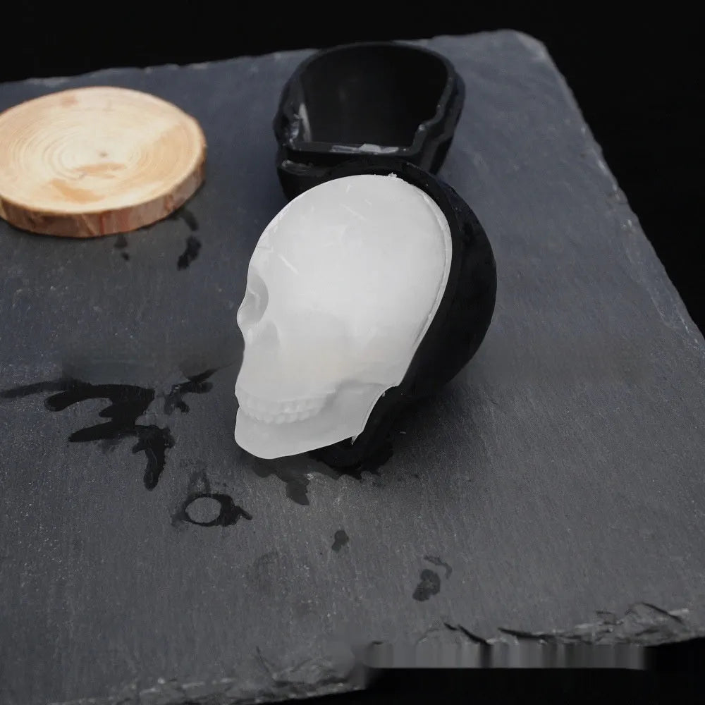 3D Halloween skull ice maker silicone tray producing a single large skull ice cube.