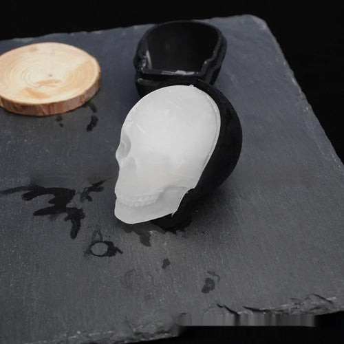 3D Halloween skull ice maker silicone tray producing a single large skull ice cube.