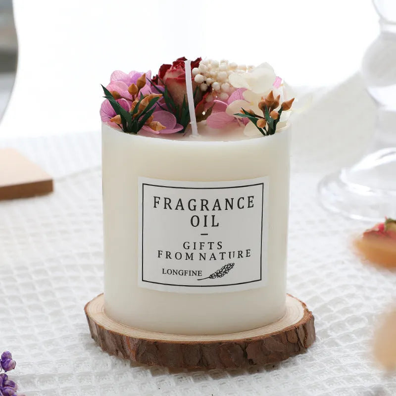 330g aromatherapy candle with embedded dried flowers, available in nine fragrances with optional gift box and wooden base