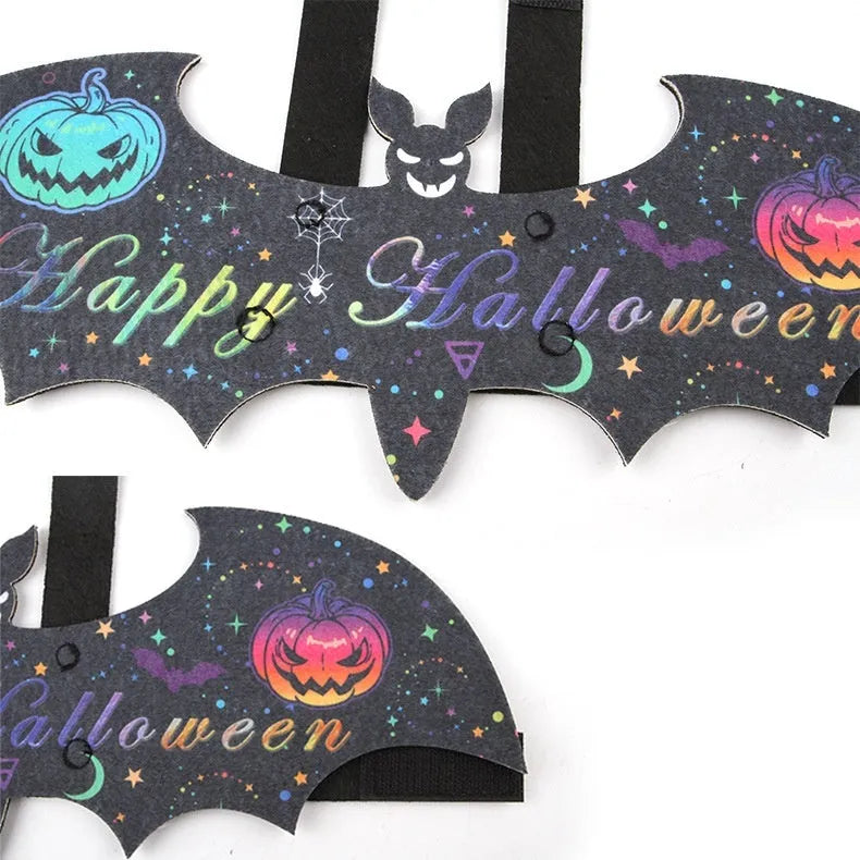 Halloween batwing costume for a cat in felt, shown in pumpkin bat colour on a feline.