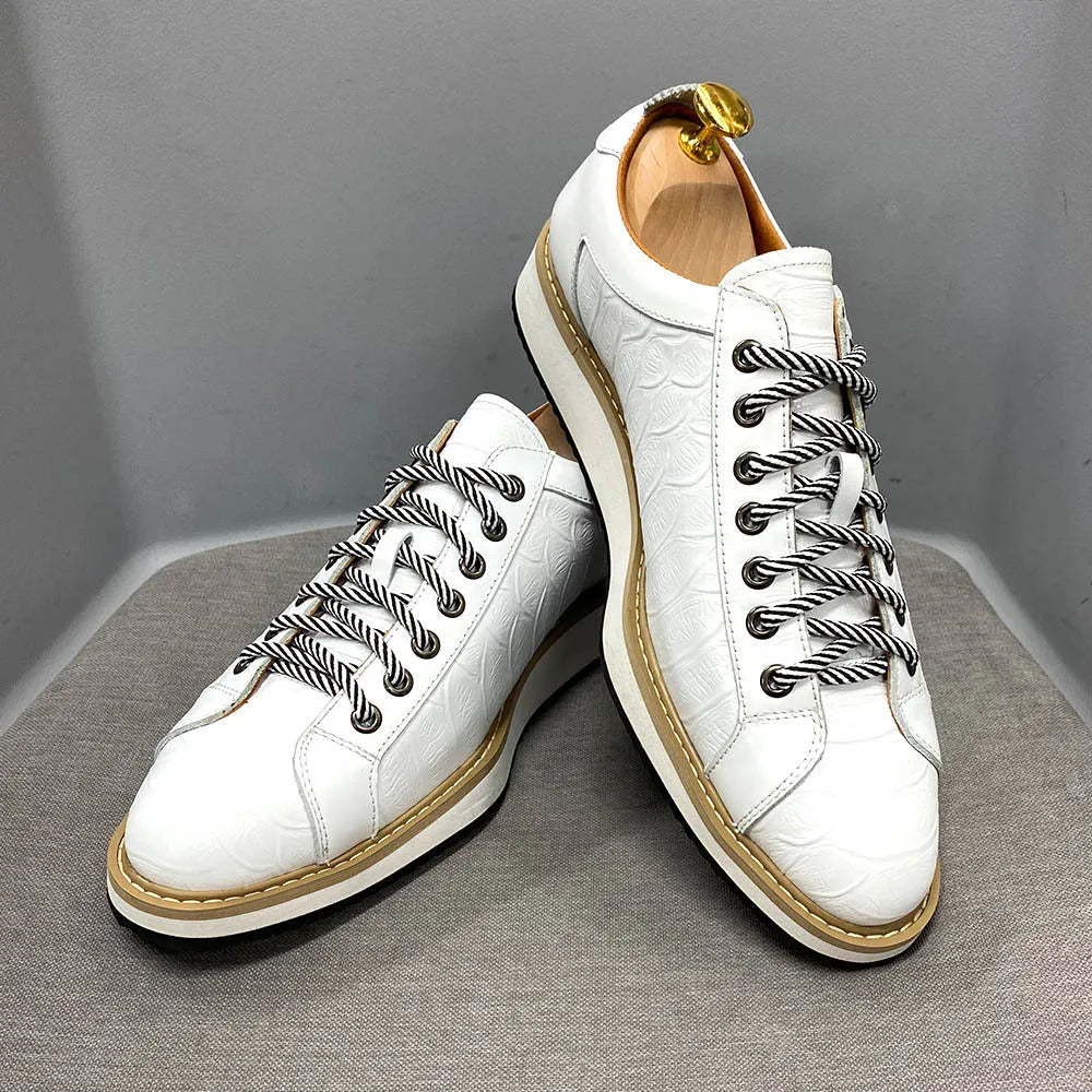 Men's handmade black leather shoes with embossed pattern, low tube height, and front lace-up fastening.