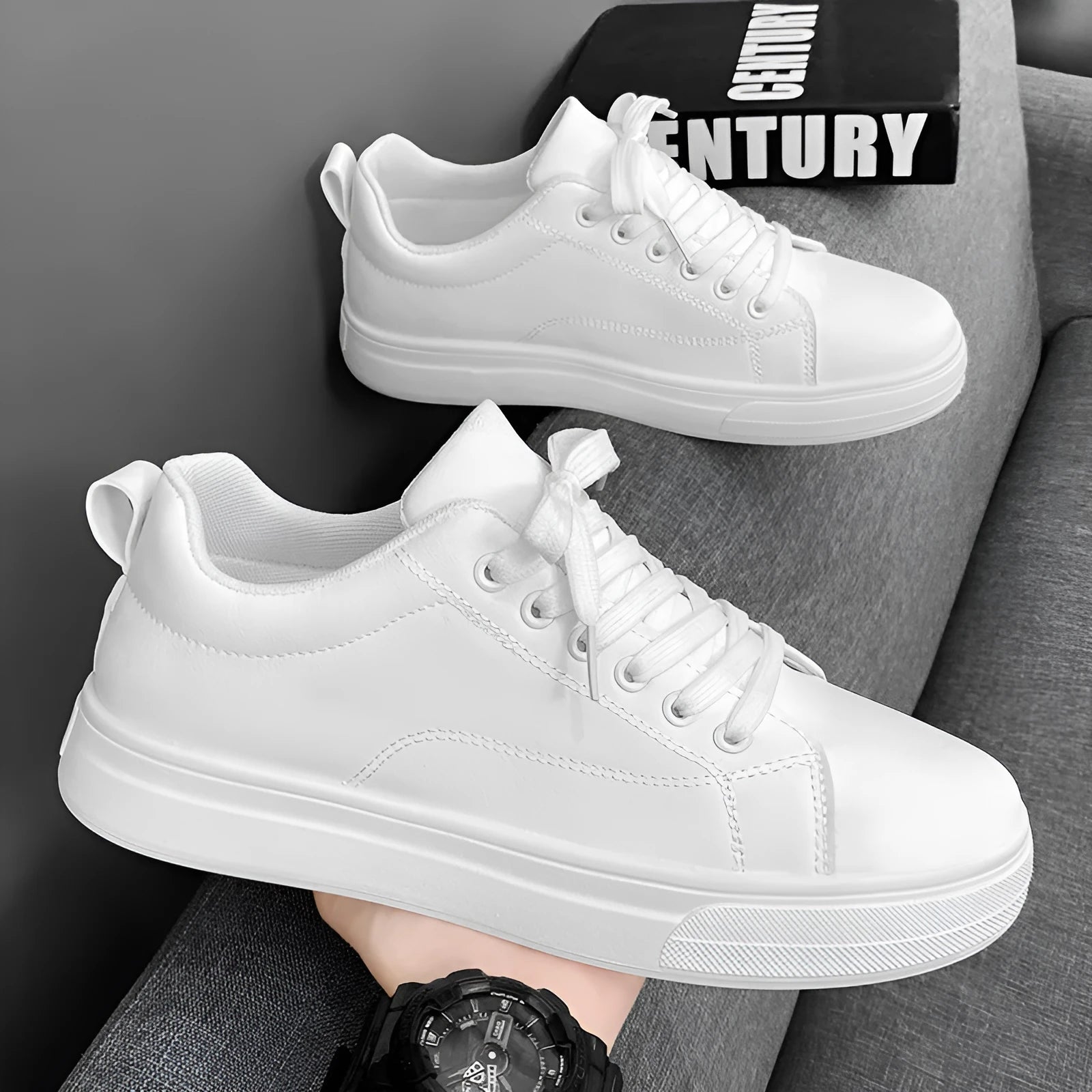 Men's low-top casual sneakers in white, black, or black with white sole, showing round toe and flat rubber sole.
