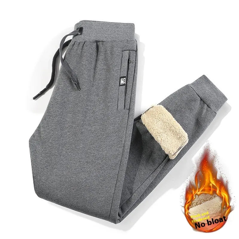 Men's grey fleece-lined cotton track pants with elastic waist in plus-size fit