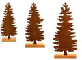 Set of three rusty metal Christmas tree decorations with elk silhouettes on a rustic surface.
