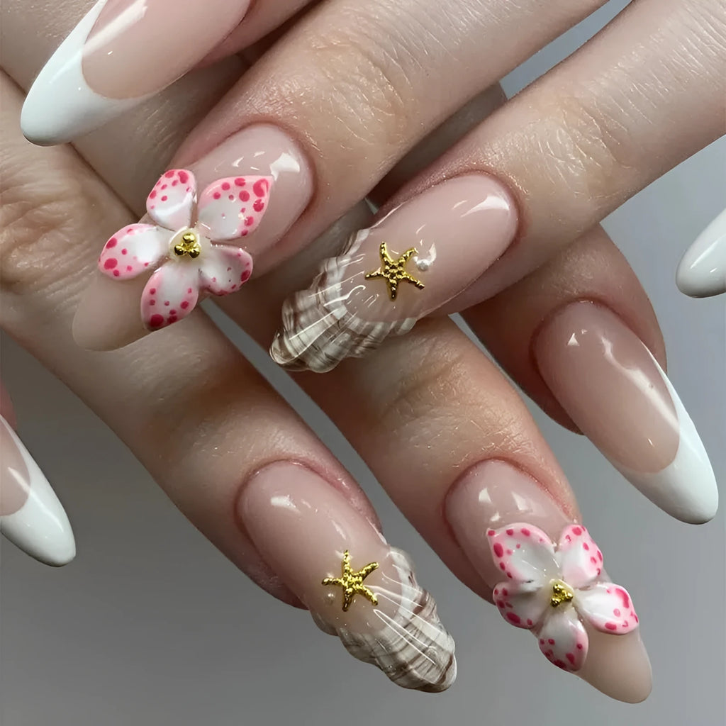 French style false nails with simple white flower and rock pattern design on a pink background, colour W1764.