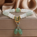 Green women's bracelet with Tian Shan Cui abacus beads and butterfly tassel