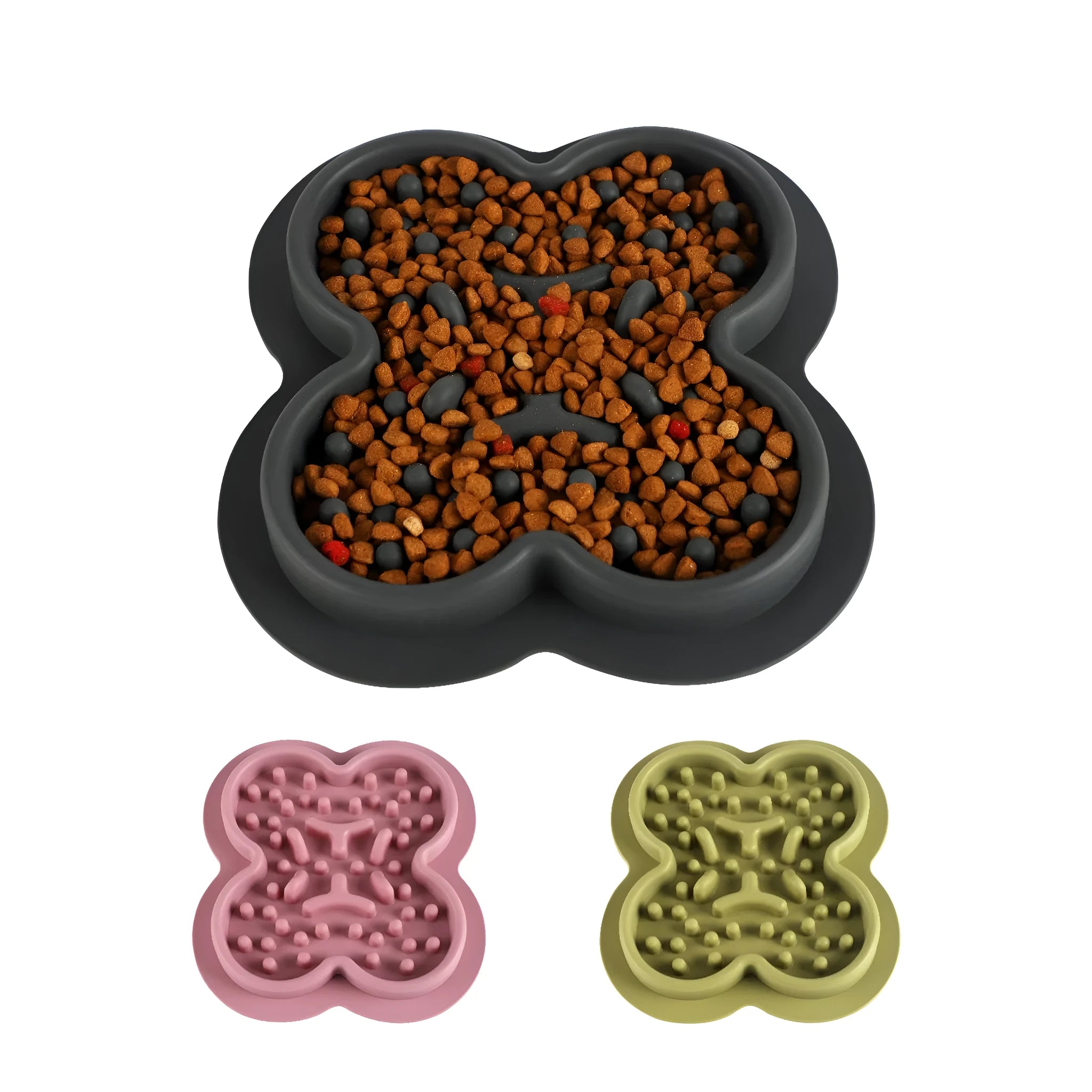 Silicone pet slow feeder licking pad in green colour on a wooden floor