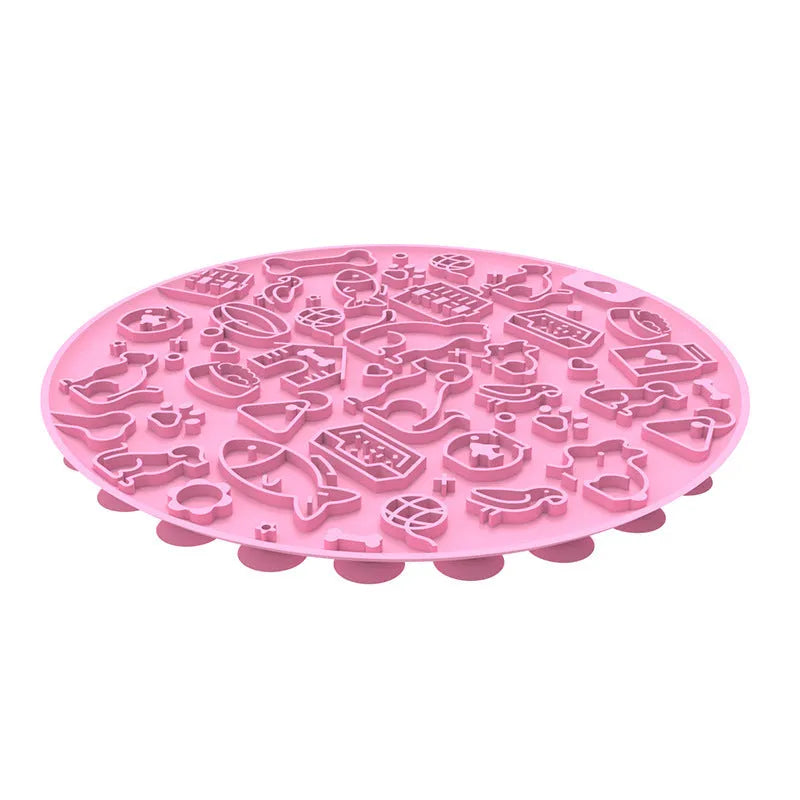 Round blue silicone pet licking mat with textured surface and a white suction cup on the base.