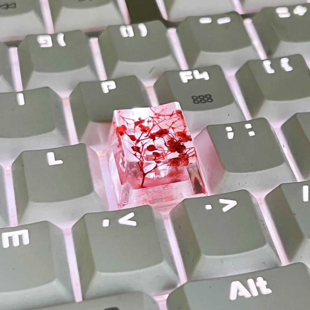 A high-transparency resin mechanical keyboard keycap with a starry sky design, shown in a choice of colours.
