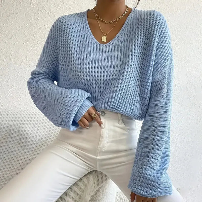 Women's long sleeve pullover in solid colour with loose casual fit and threads decorative element