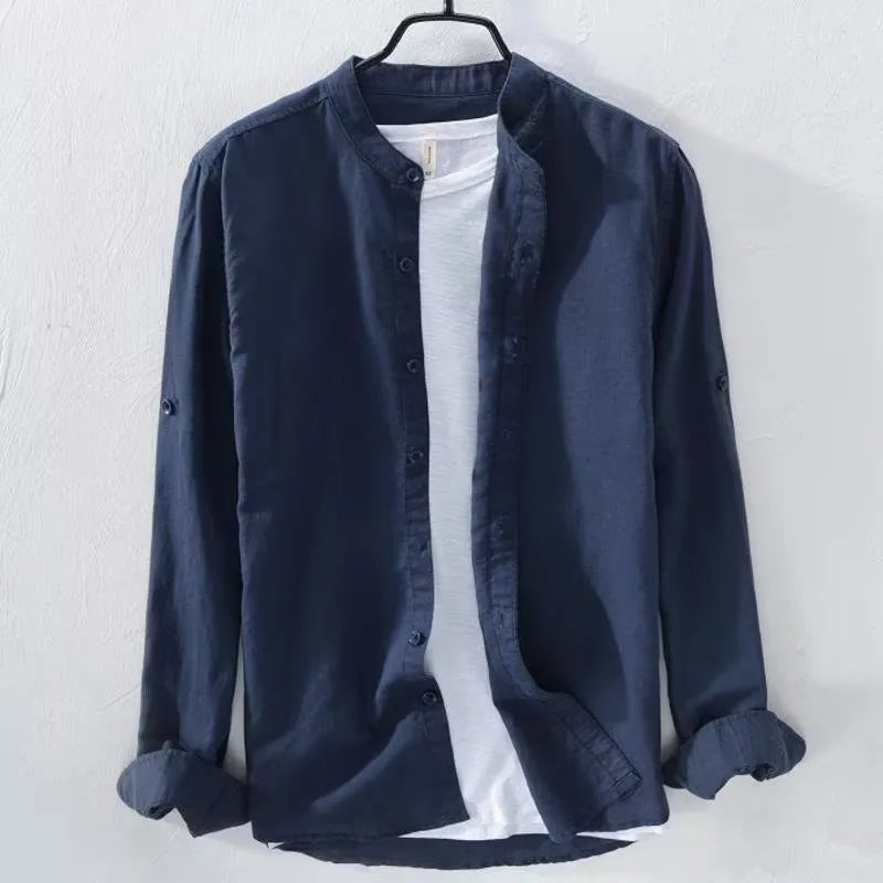Loose fit long sleeve cotton linen shirt in solid colours on a hanger.