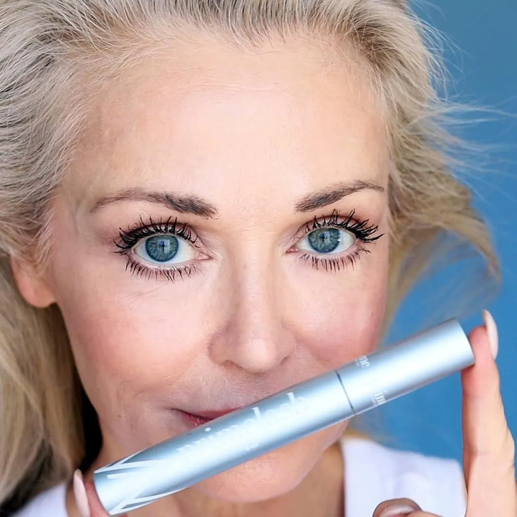 Eyelash brush comb beauty tool with fine plastic bristles for mascara application