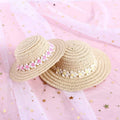 Handmade adjustable paper pet hat with a large bowknot for a dog or cat, shown in a cartoon style.