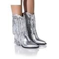 Women's black chunky heel tassel boots with stiletto heel and pointed toe on a white background.