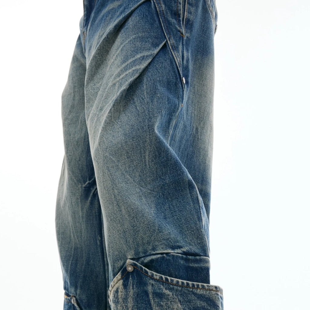 Men's verdant blue retro jeans with washed burst pattern and curved knife detailing