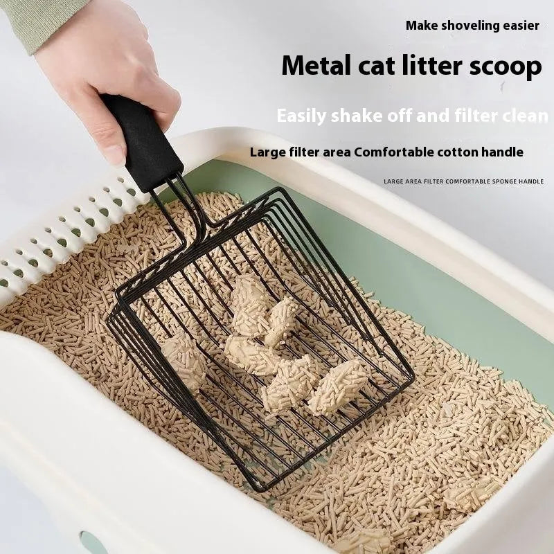 Black metal cat litter scoop with narrow tines for sifting waste from litter