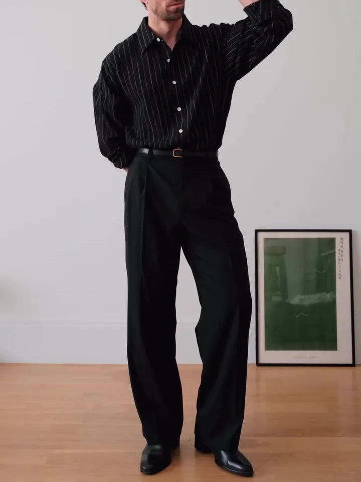 Man's black and white pinstriped long sleeve formal button-down shirt
