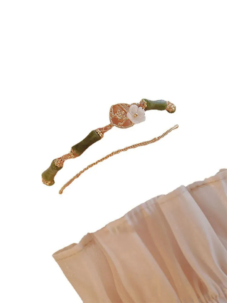 Handmade natural olivine bracelet with double layer Twin Bells of Ireland design and olive branch elements