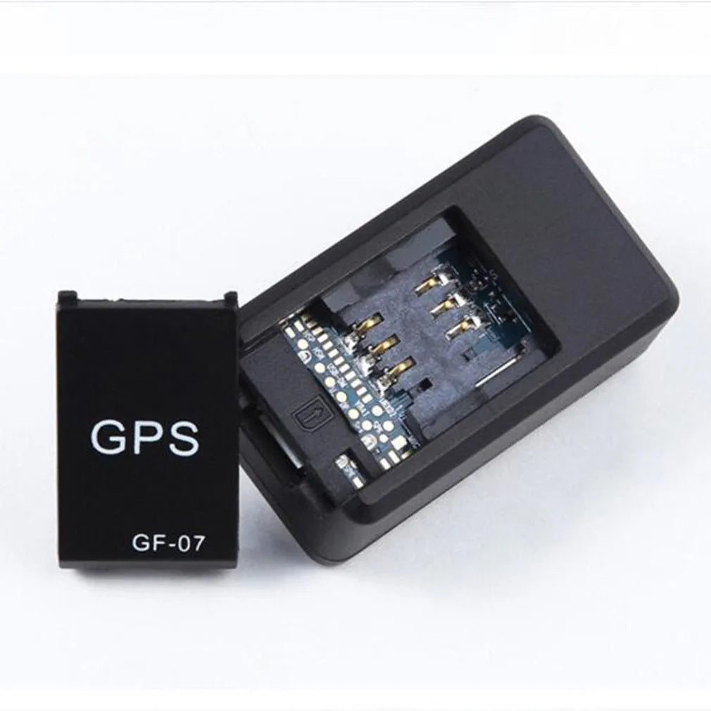 Black plastic mini magnetic GPS car tracker measuring 35×20×14mm with USB charging cable