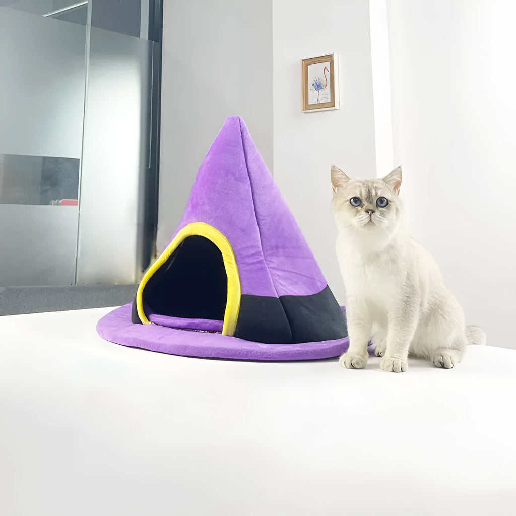 Purple cloth Halloween witch hat shaped cat bed measuring 60x45cm