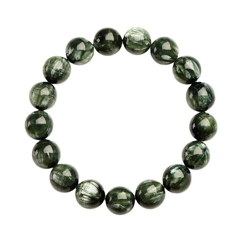 Natural green dragon crystal bracelet with 8-9mm round beads and Ruyi design on wrist.