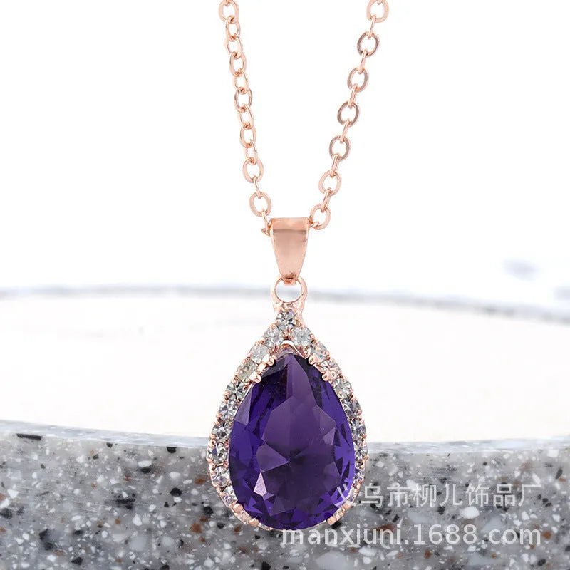 Women's rose gold electroplated rhinestone necklace with geometric water drop pendant in pink colour