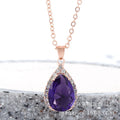 Women's rose gold electroplated rhinestone necklace with geometric water drop pendant in pink colour