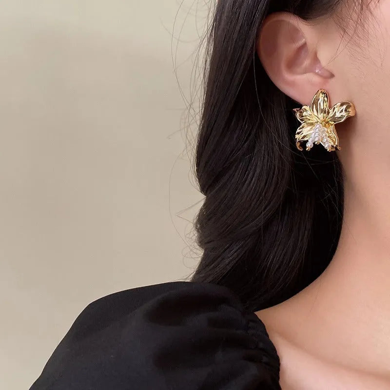 Golden flower earrings with pearl designs and exaggerated floral shape for women