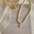 Adjustable French Court vintage pearl necklace with geometric shapes on a 21-50cm alloy chain.
