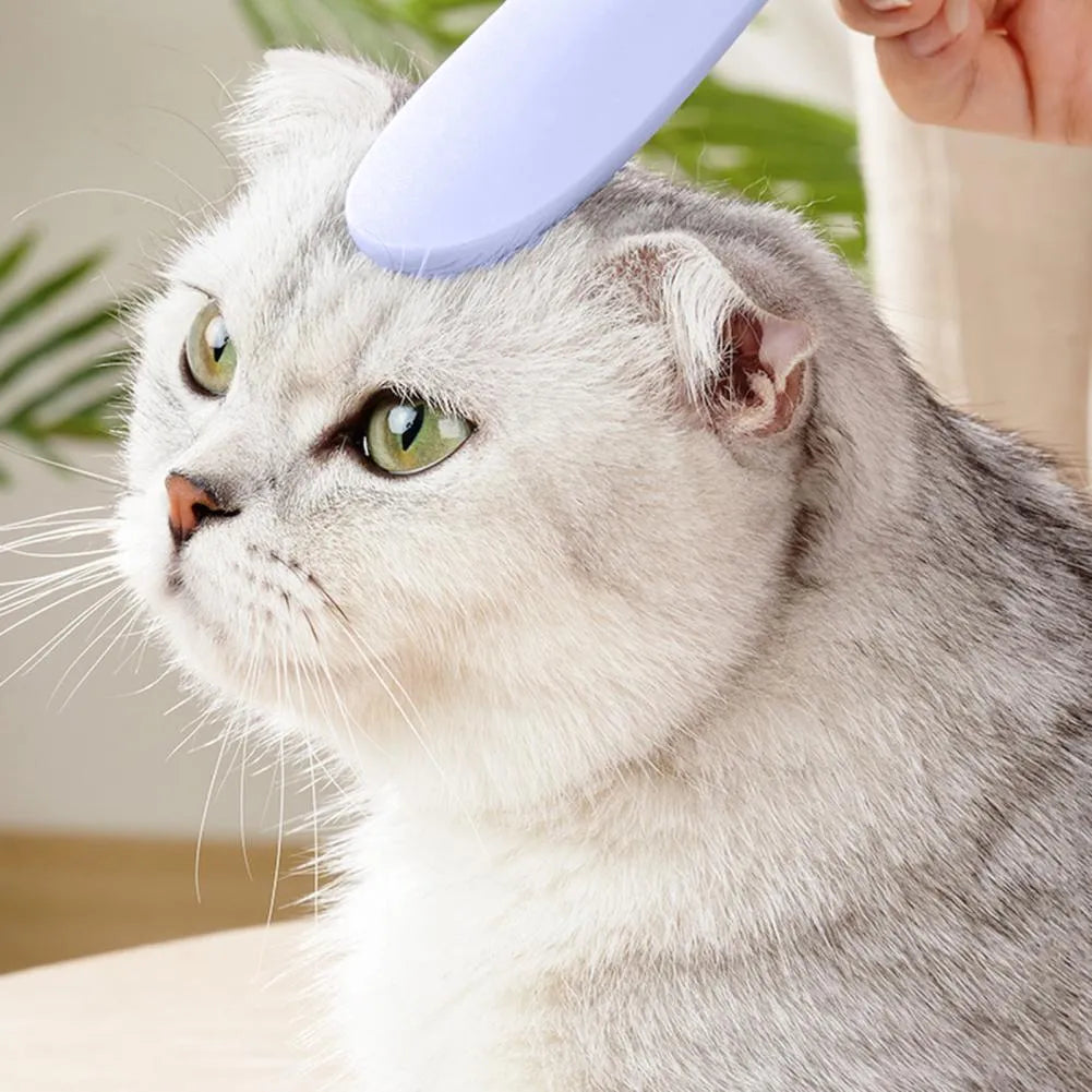 Grey and pink ABS plastic cat grooming comb with narrow and wide ends for pet hair removal