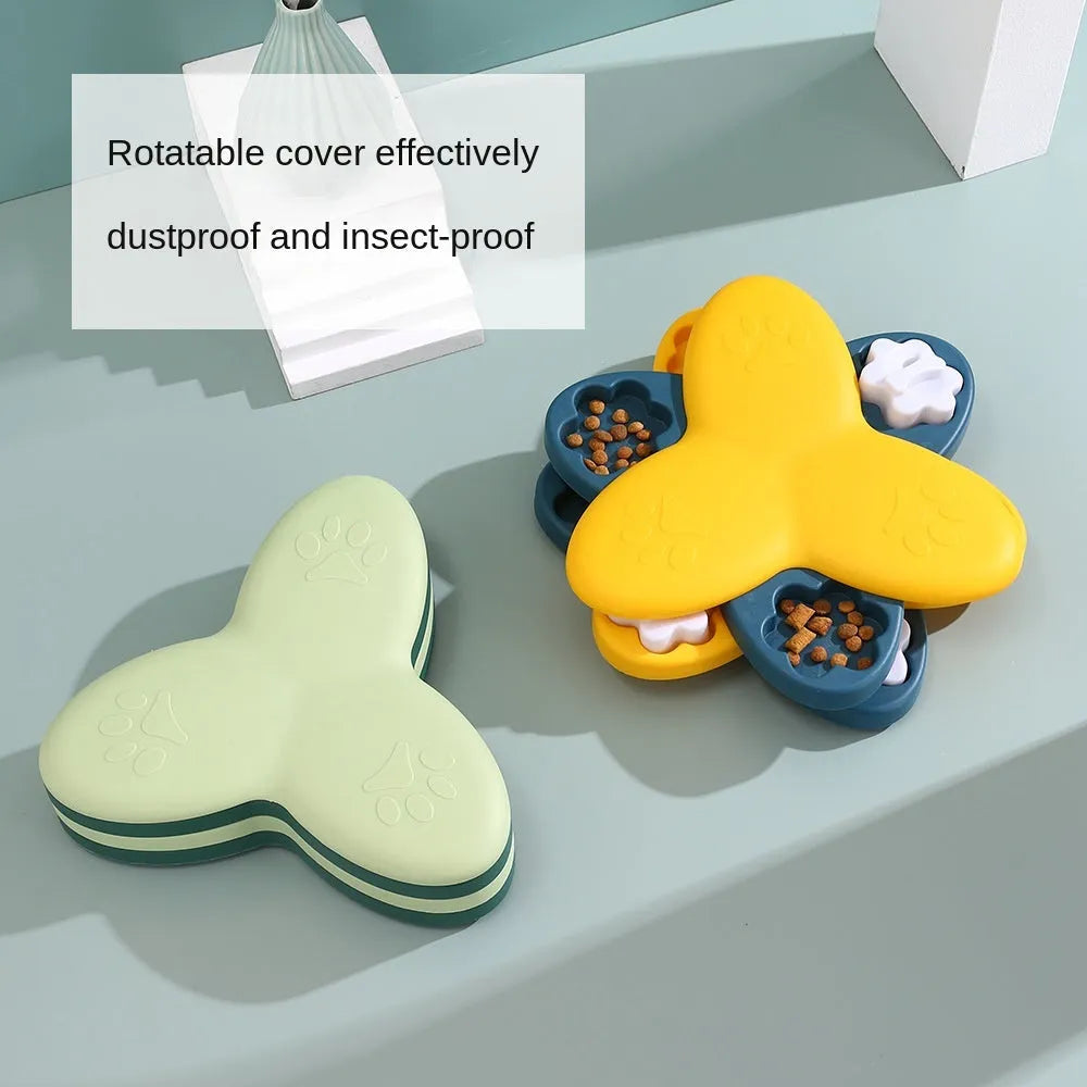 Green interactive dog puzzle bowl with bone-shaped covers on a non-slip base.