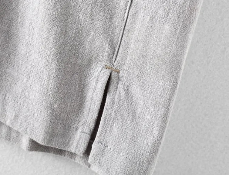 Men's cotton linen casual shirt in loose fit showing four colour options: milky white, navy blue, light grey, and sky blue