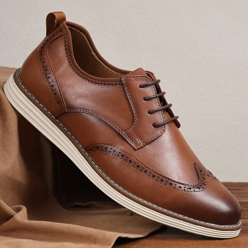 Men's black and brown slip-on business casual shoes with round toe and low top.